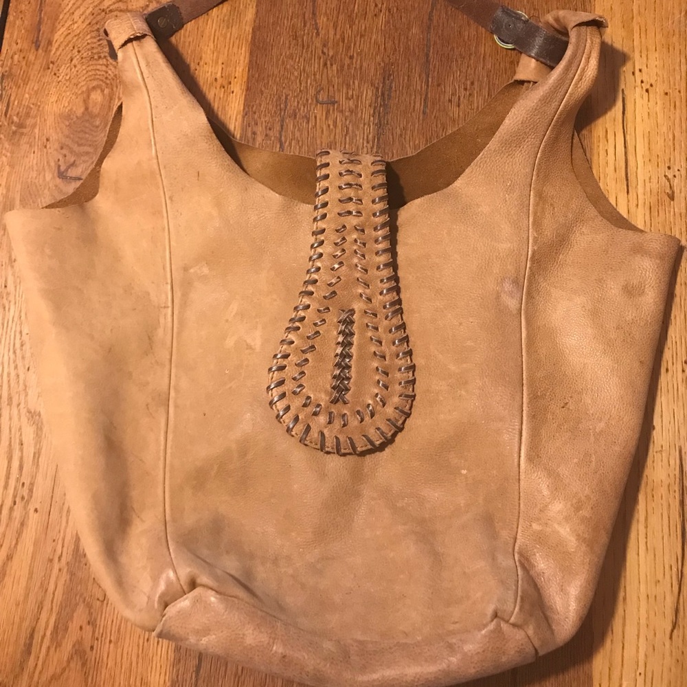 Raw edge leather hobo.
